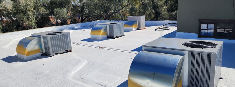 Rooftop package units on a flat roof in the Phoenix metro