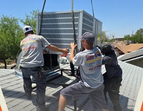 State Forty Eight technicians setting a rooftop air conditioning unit in Peoria, Arizona