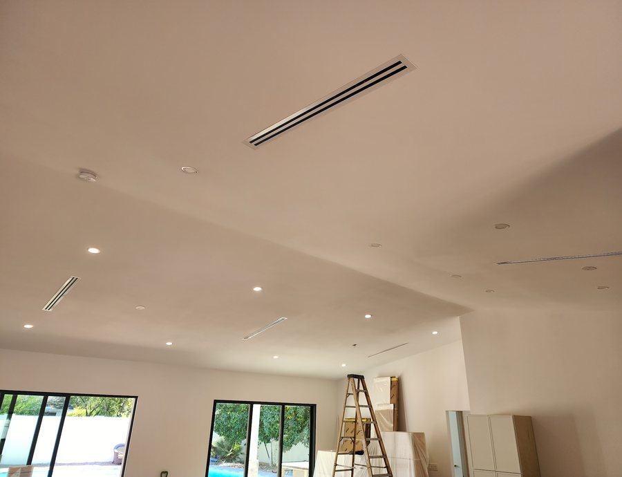 Linear ceiling diffuser in a bright Phoenix area home