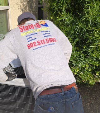 State Forty Eight technician working on an outdoor condensing unit